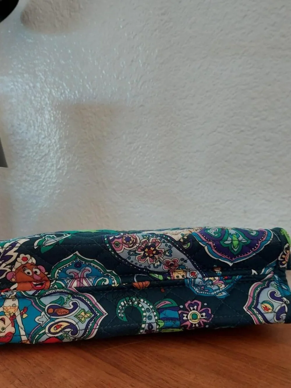 vera bradley Disney Pixar Toy Story quilted pouch with green dinosaur graphic an